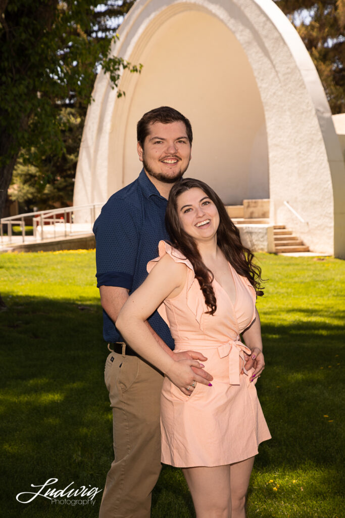 a young couple smiling and having fun outdoors in Wyoming