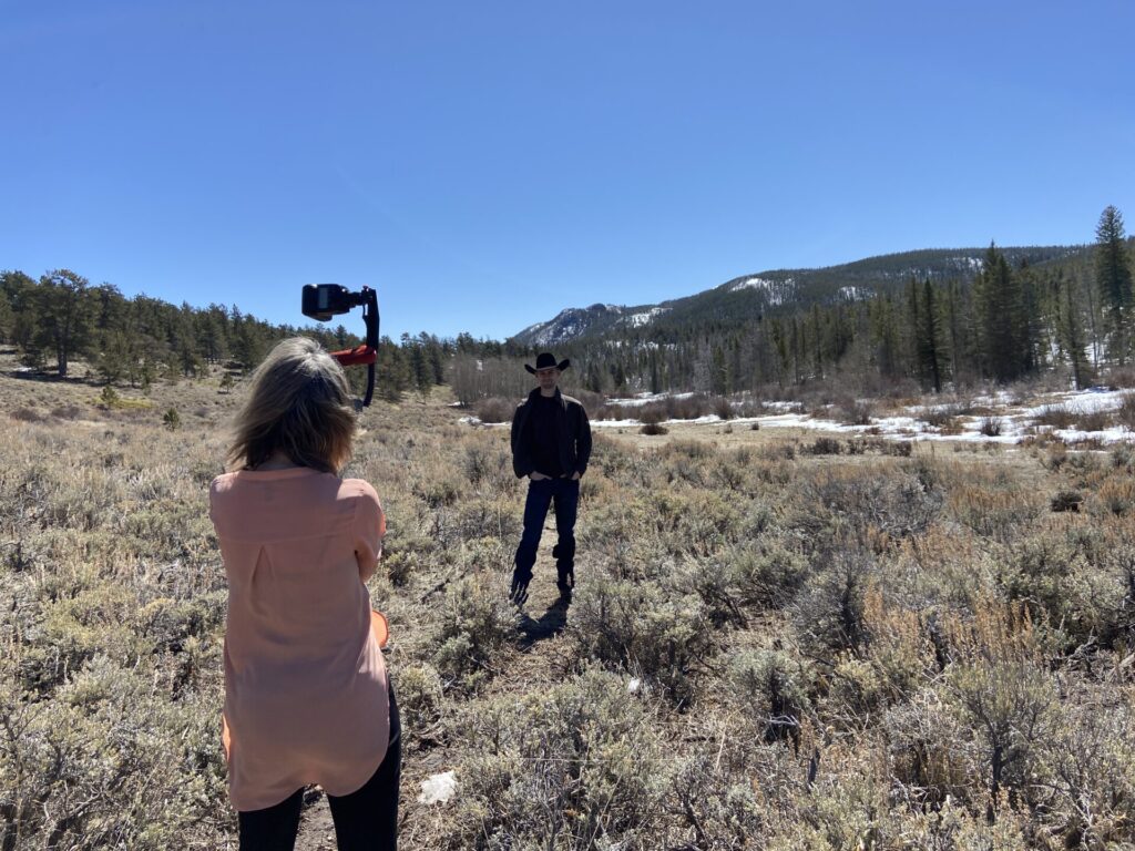 Photographer Anne Brande photographing a senior at Happy Jack in Laramie Wyoming. Ludwig