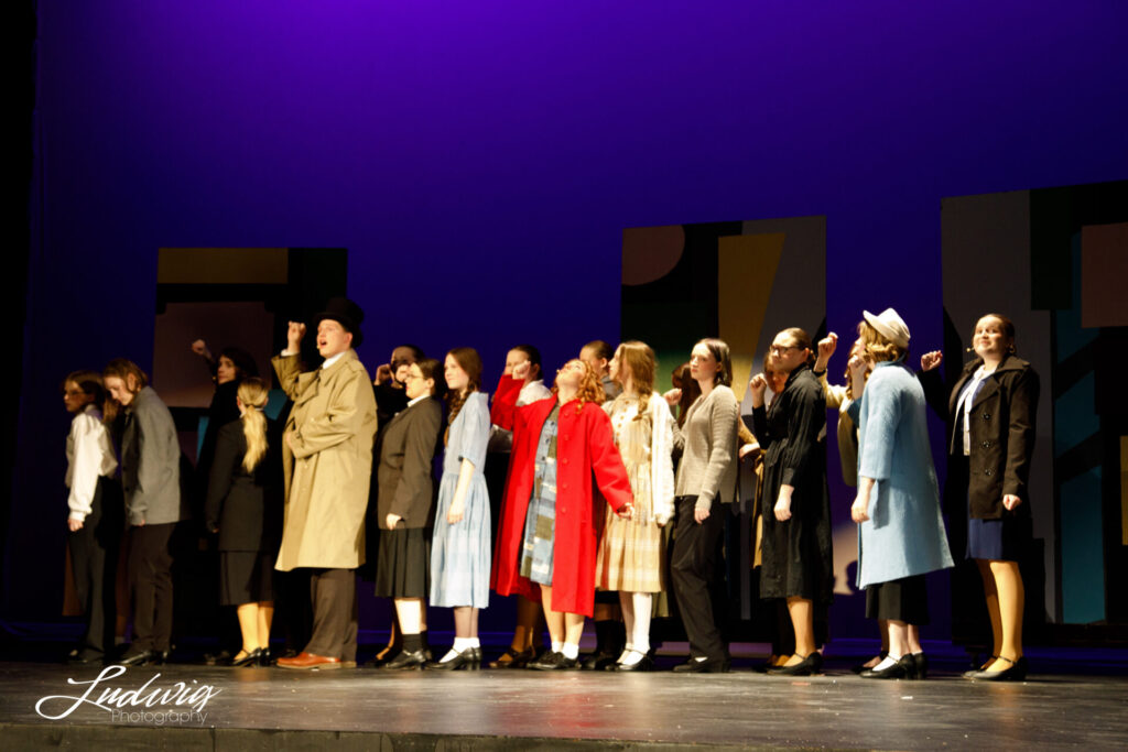 Performers on stage during Laramie High School's performance of Annie