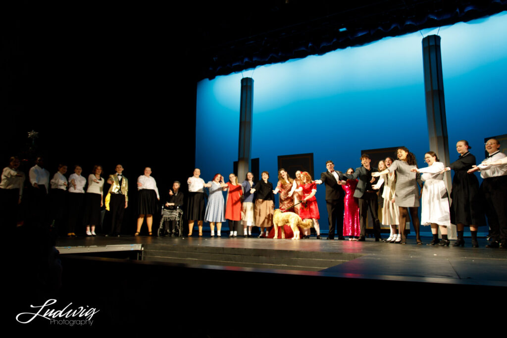 The cast of Annie on stage during the finale, Laramie High school theatre