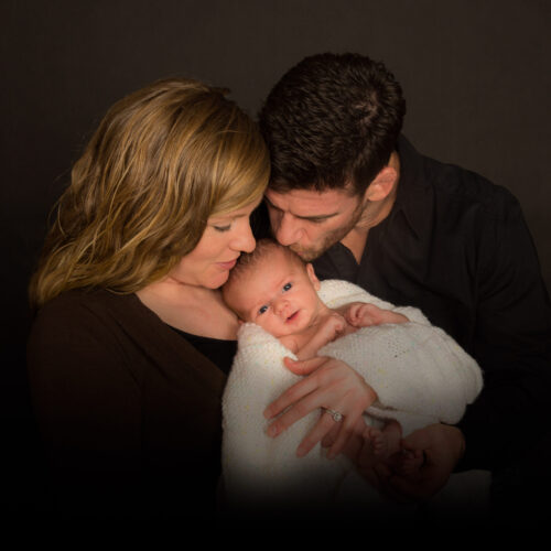 newborn photo with parents